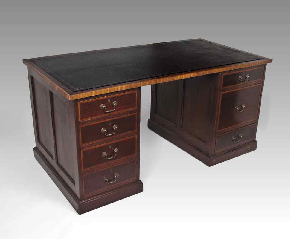 Appraisal: EDWARDIAN MAHOGANY DESK Inset tooled leather top with gilt decoration