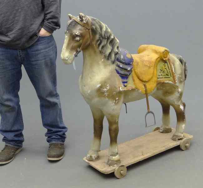 Appraisal: Early th c painted papier mache platform horse '' Length