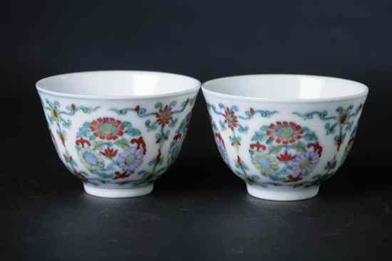 Appraisal: PAIR CHINESE DOUCAI PORCELAIN WINE CUPS Yongzheng underglazed blue six