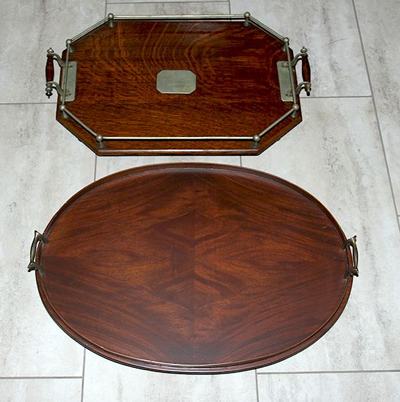 Appraisal: Wooden Serving Trays A pair of wooden serving trays one