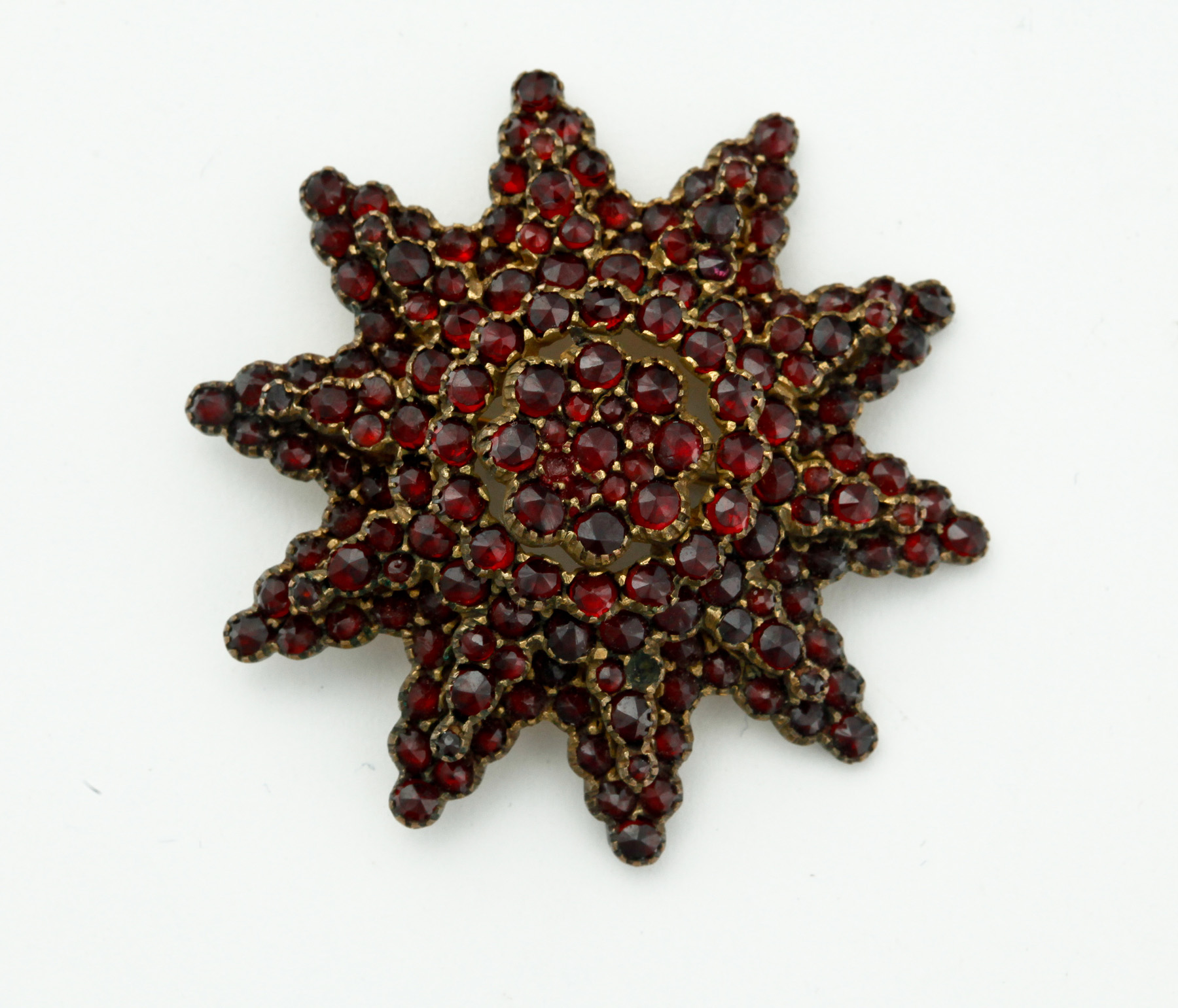 Appraisal: VICTORIAN BOHEMIAN GARNET BROOCH European late th century Victorian gold