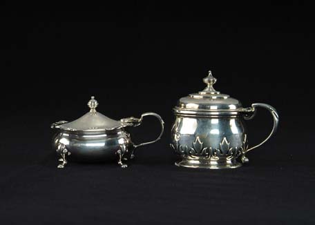 Appraisal: TWO COBALT LINED ENGLISH STERLING MUSTARD POTS h handled oval