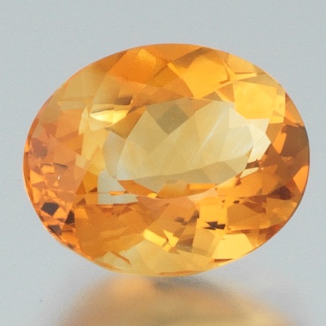 Appraisal: AN UNMOUNTED ORANGE OVAL CITRINE WEIGHING CT An unmounted orange