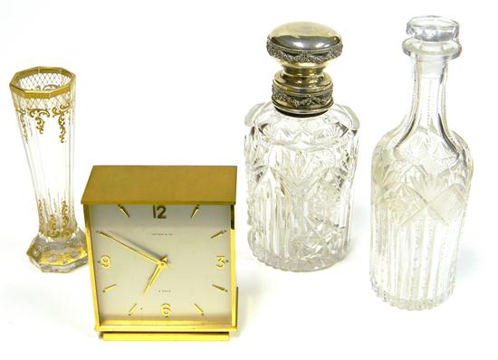 Appraisal: Four pieces including two cut crystal bottles one with silver