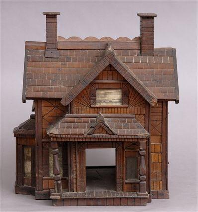 Appraisal: FOLK TRAMP ART MODEL OF A HOUSE With multiple gables