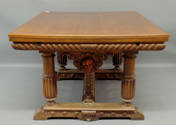 Appraisal: Jacobean style walnut extending library table with faux wood mask