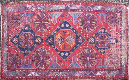 Appraisal: A Soumac carpet th century the red field with three