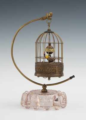 Appraisal: An Unusual Automaton Novelty Clock The small metal birdcage is