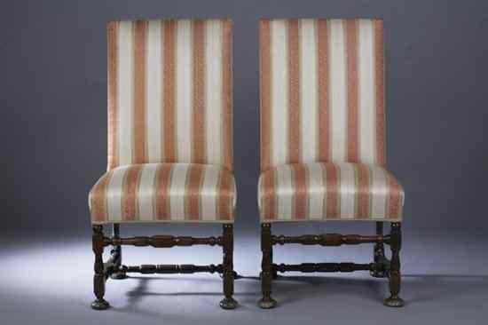 Appraisal: PAIR BAROQUE STYLE MAHOGANY HALL CHAIRS Padded back above stuff-over