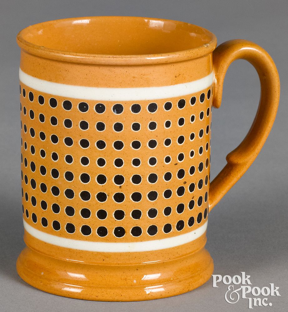 Appraisal: Small mocha mug with dotted decoration Small mocha mug with