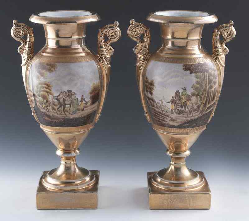 Appraisal: Pr KPM style porcelain gilt urns the front reserves depicting