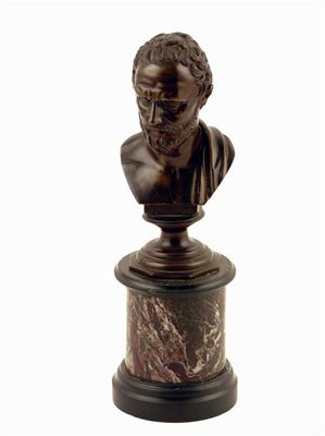 Appraisal: A late th century bronze bust of Demostene on a