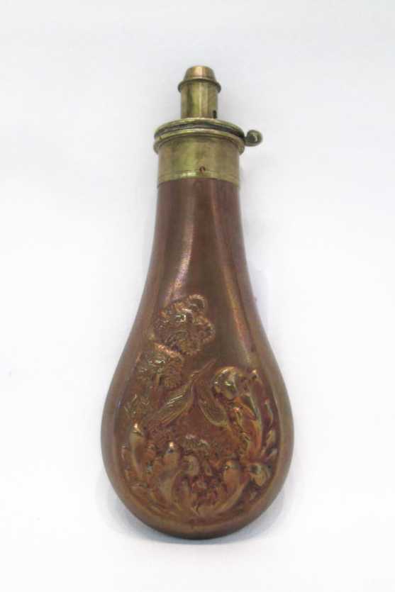 Appraisal: NINETEENTH CENTURY BRASS AND COPPER POWDER FLASK copper body embossed