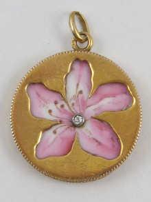 Appraisal: An Austrian hallmarked carat gold circular pendant with hand painted