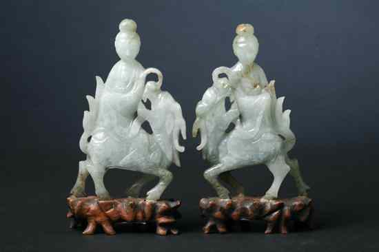 Appraisal: PAIR CHINESE CELADON JADE FIGURE OF IMMORTALS AND QILIN Qing