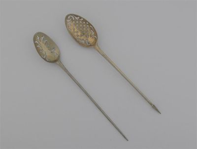 Appraisal: An early George II silvergilt rattail mote spoon pierced with