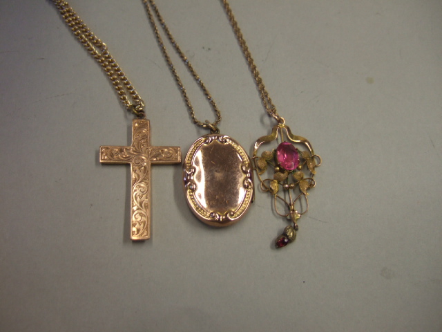 Appraisal: A gold and pink gem set pendant in a foliate