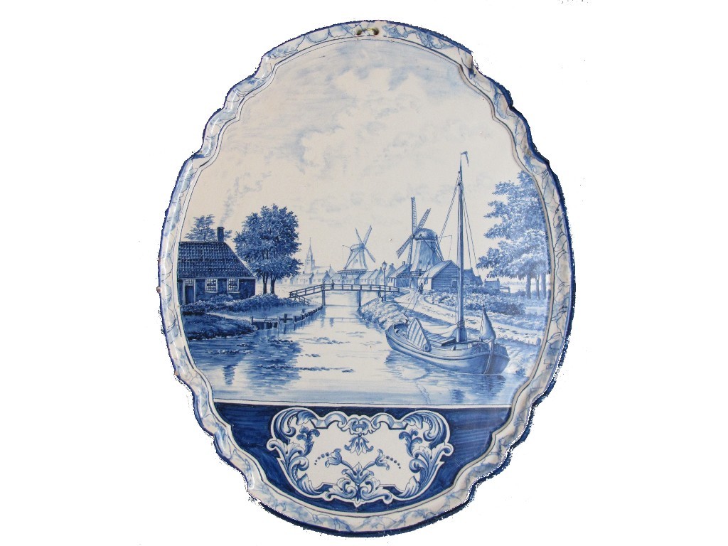 Appraisal: A pair of Dutch Delft blue and white oval shaped