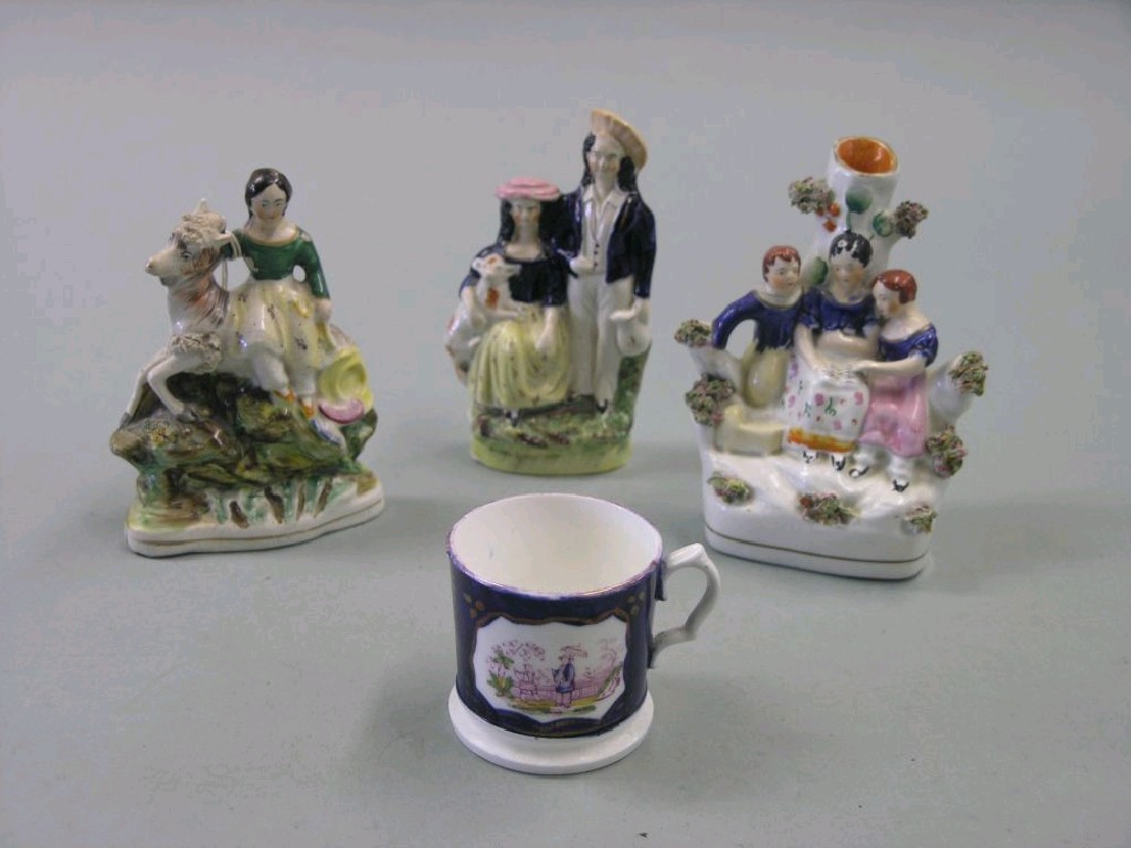 Appraisal: Three Victorian Staffordshire figure groups four other ceramic ornaments and