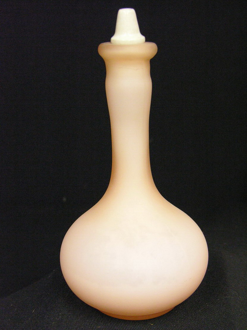 Appraisal: PEACH SATIN GLASS BARBER BOTTLE Size Excluding pour spout Condition