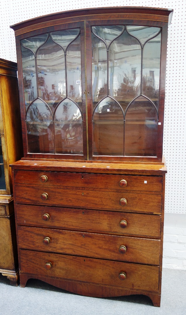 Appraisal: A George III mahogany secretaire bookcase the arch top with