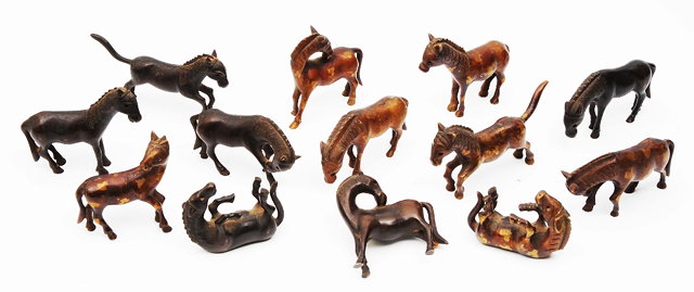 Appraisal: Two groups of Chinese bronze miniature model horses - with