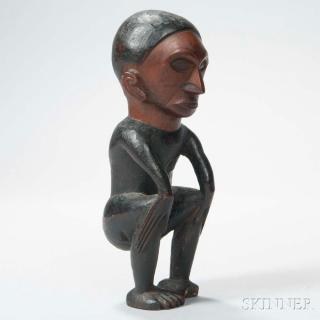 Appraisal: South African Carved Wood Female Figure with elongated fingers and