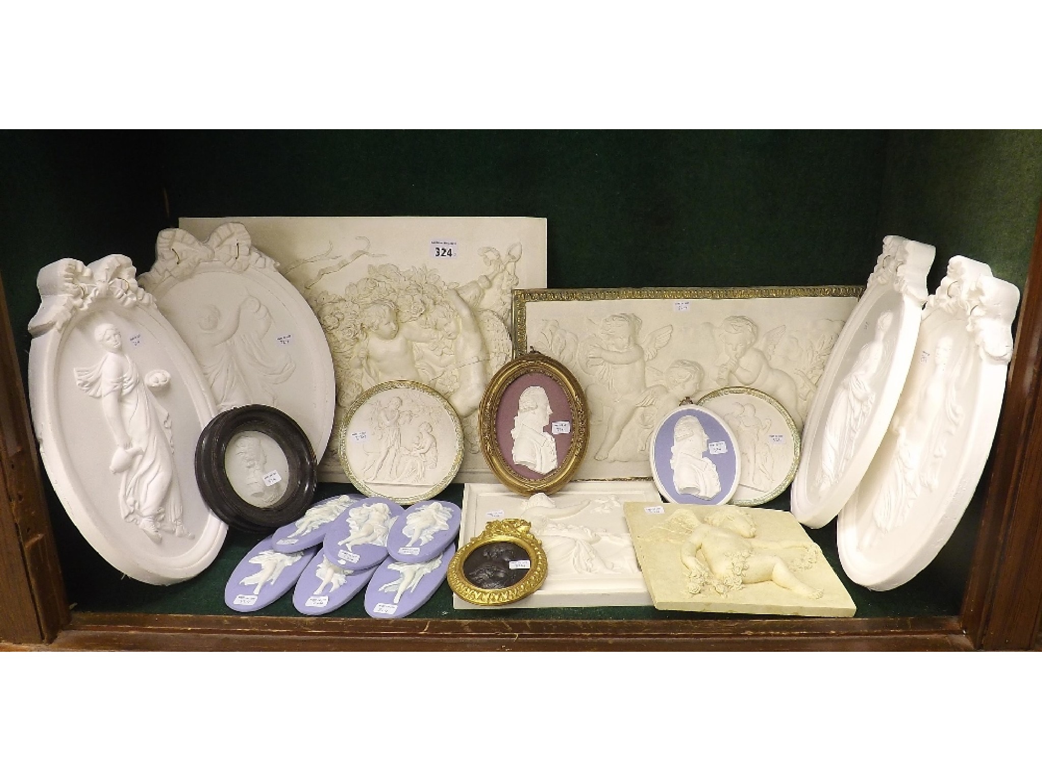 Appraisal: Collection of plaster and other leaf moulded plaques and panels