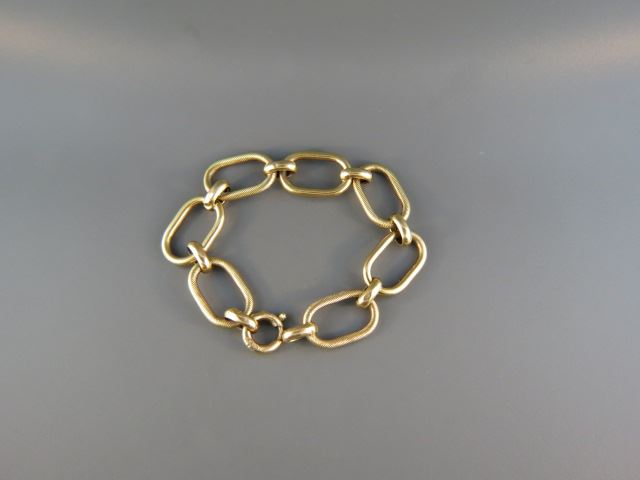 Appraisal: k Gold Bracelet large oval links alternating braided design wide