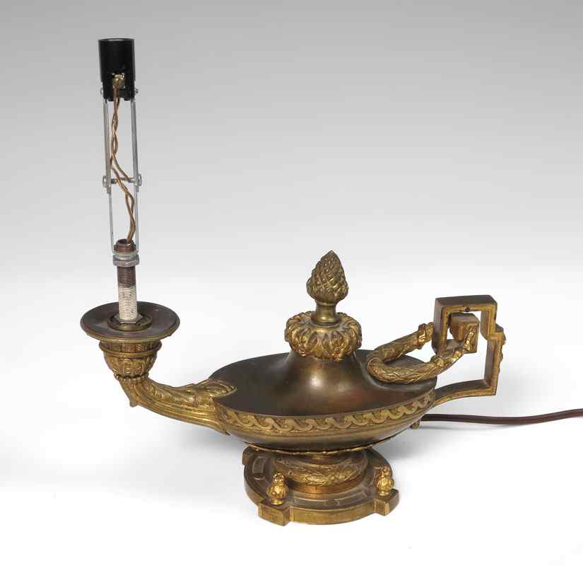 Appraisal: ALADDIN BRONZE LAMP Electrified lamp in the form of an