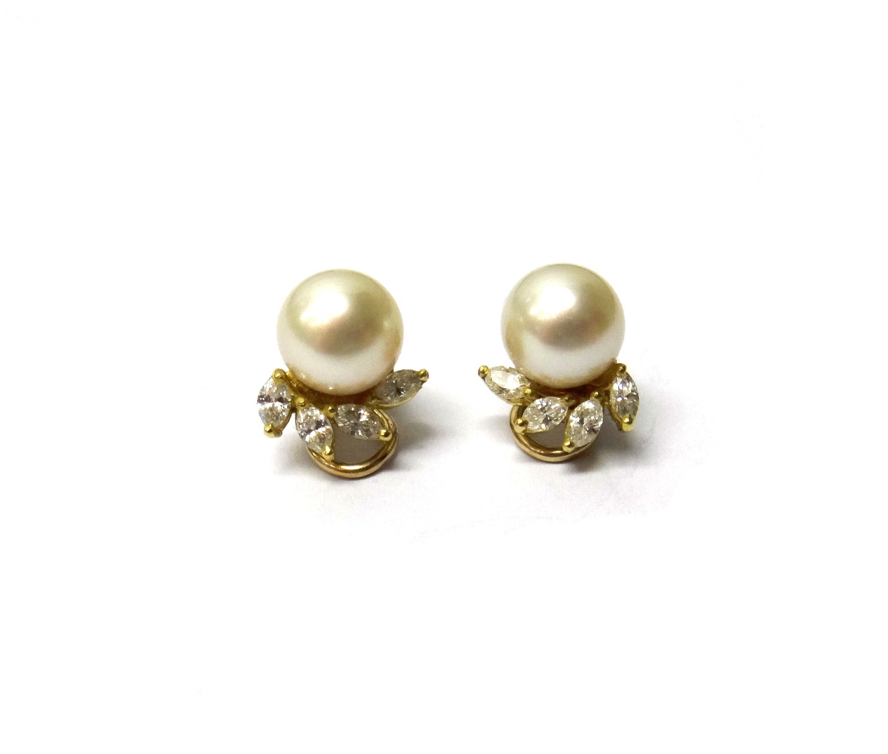 Appraisal: A pair of gold diamond and cultured pearl set earclips