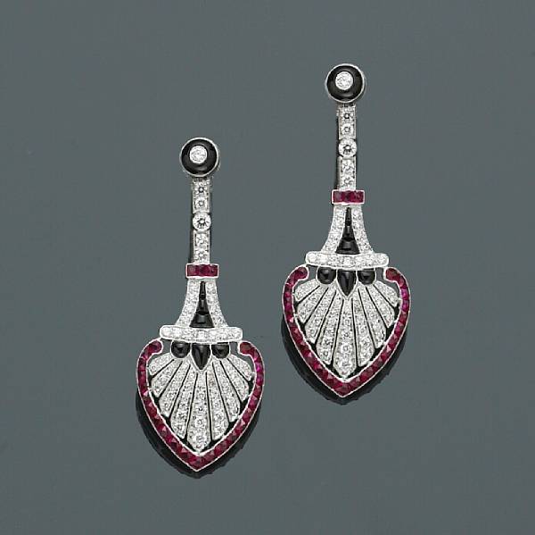 Appraisal: A pair of diamond ruby and black onyx earrings estimated