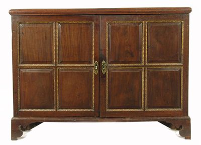 Appraisal: A George II mahogany cabinet the later moulded edge top