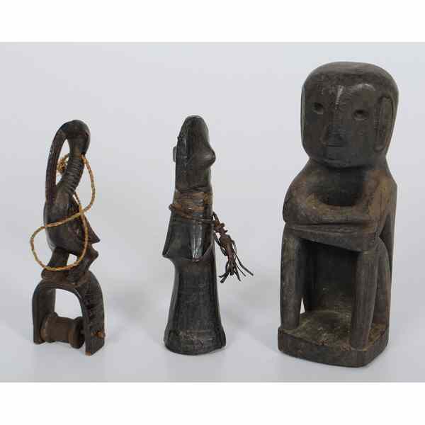 Appraisal: West African and New Guinea Figures lot of including an