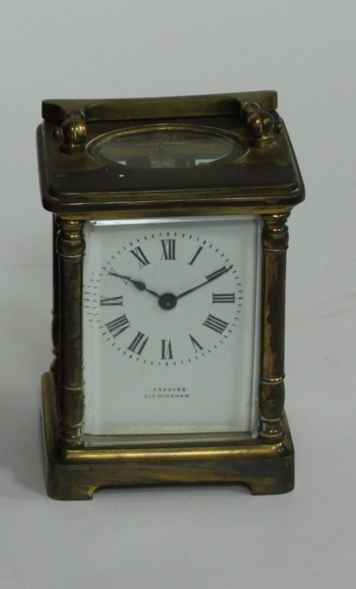 Appraisal: A carriage clock the white enamel dial with Roman numerals