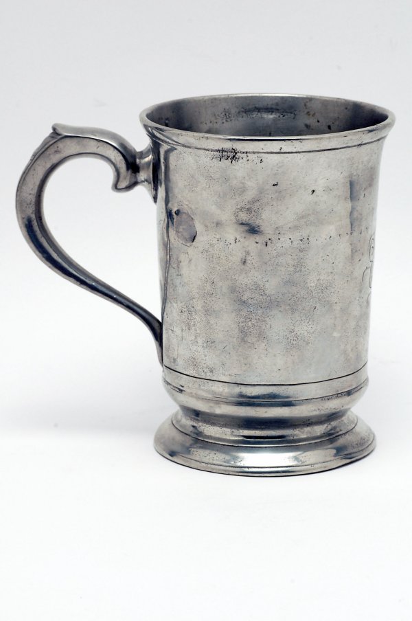 Appraisal: Large handwrought English pewter mug late th century cylindrical in