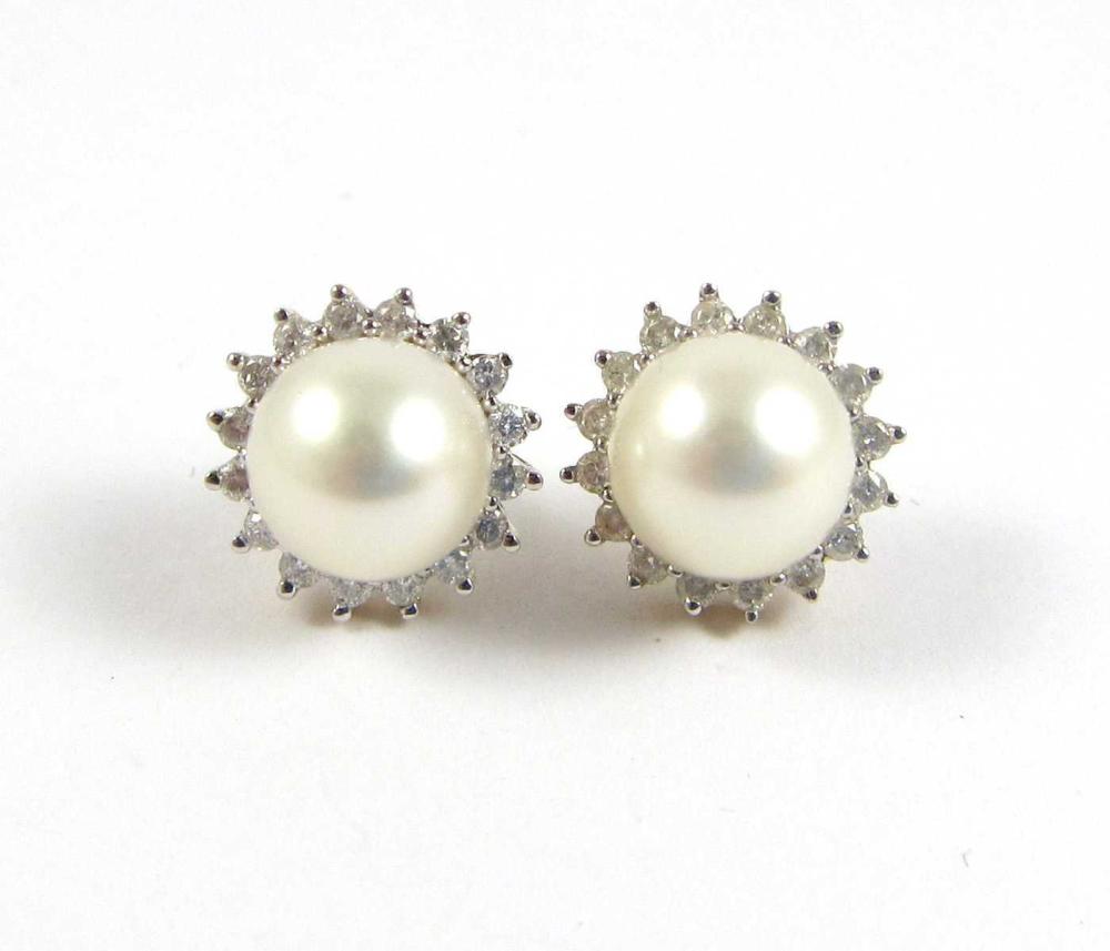 Appraisal: PAIR OF PEARL AND DIAMOND STUD EARRINGS each k yellow