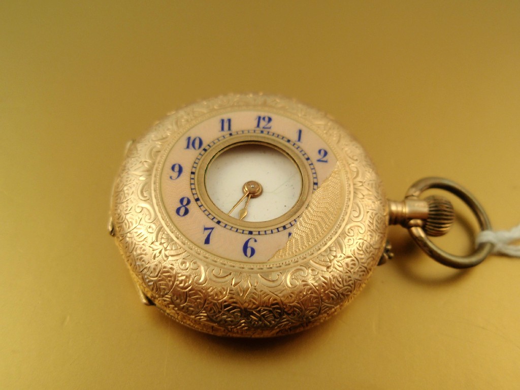 Appraisal: A mid size half hunter pocket watch case stamped K