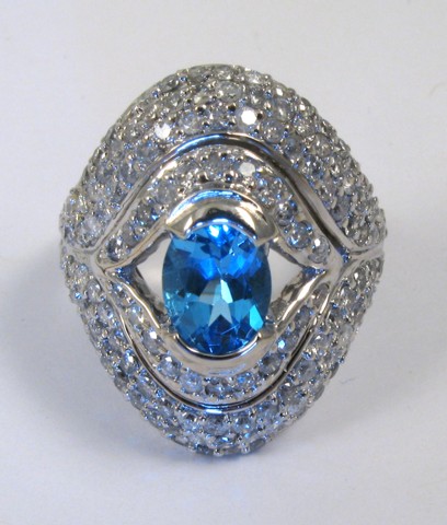 Appraisal: BLUE TOPAZ AND DIAMOND RING k white gold The top