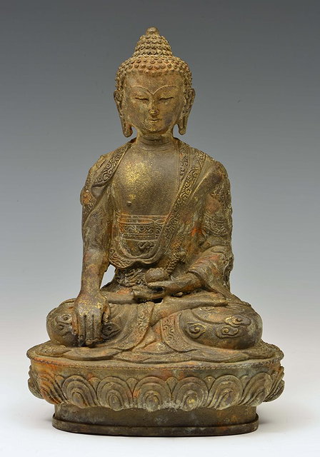 Appraisal: A SINO-TIBETAN METAL BUDDHA in Mudra pose on single lotus