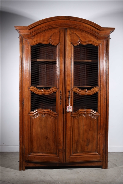 Appraisal: Antique wood cabinet carved double-doors with mesh removable top four