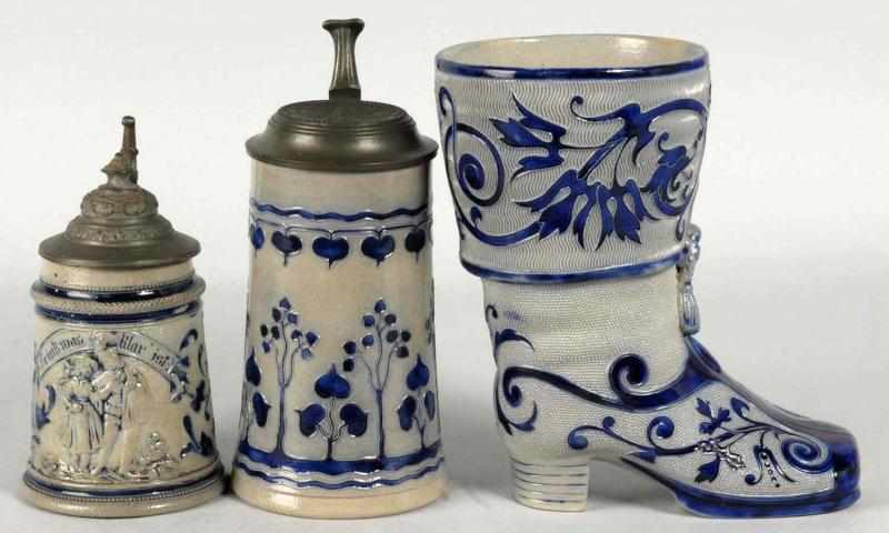 Appraisal: Lot of Gray and Blue German Pottery Steins Description Includes