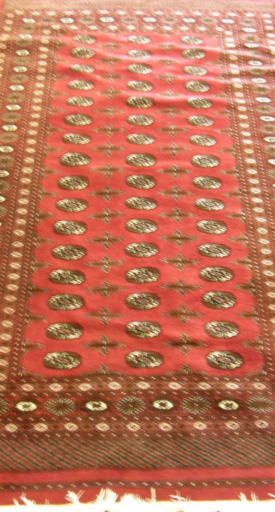 Appraisal: Modern red ground Persian rug with multiple borders the centre