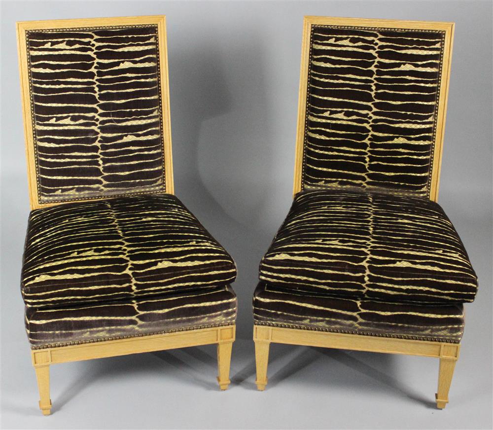 Appraisal: PAIR OF PICKLED OAK SLIPPER CHAIRS AFTER JEAN-MICHEL FRANK ESTATE