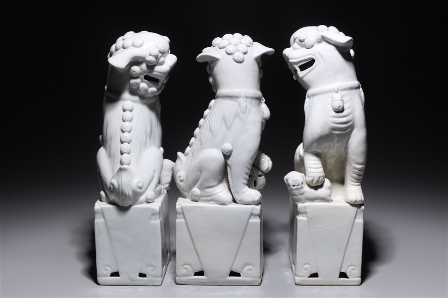 Appraisal: Group of three Chinese blanc de chine porcelain foo lions