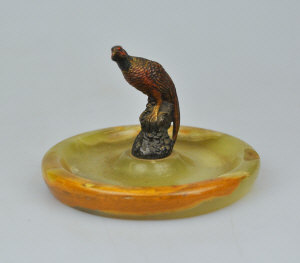 Appraisal: A cold painted bronze pheasant mounted on an onyx trinket