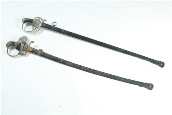 Appraisal: TWO SWORDS European late th-early th century Artillery sword marked