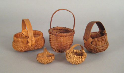 Appraisal: Group of five miniature splint oak baskets th c largest