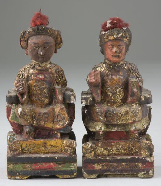 Appraisal: Two Chinese Lacquered Figures th century both depict seated males