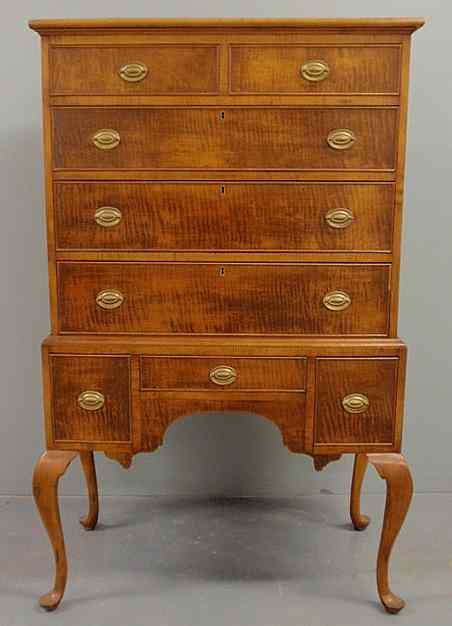 Appraisal: Queen Anne style tiger maple highboy th c h x